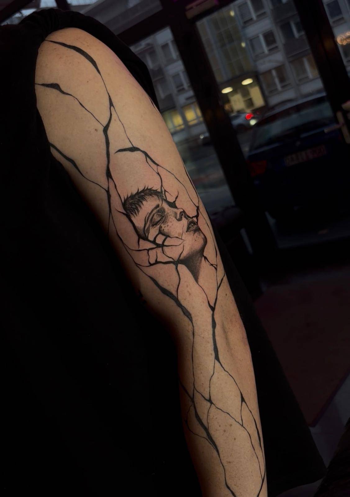 Abstract realism tattoo