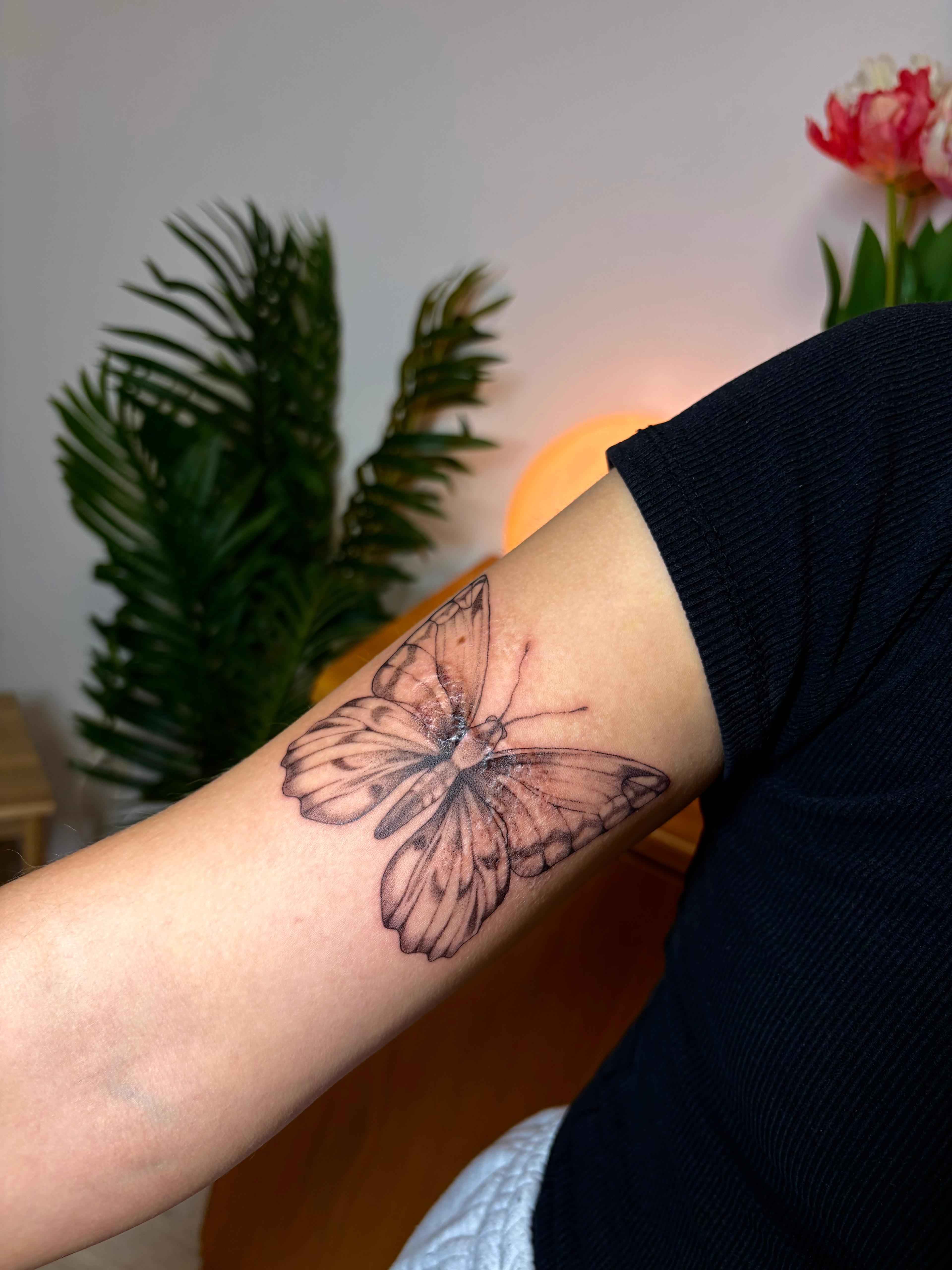 Fine line dotwork tattoo