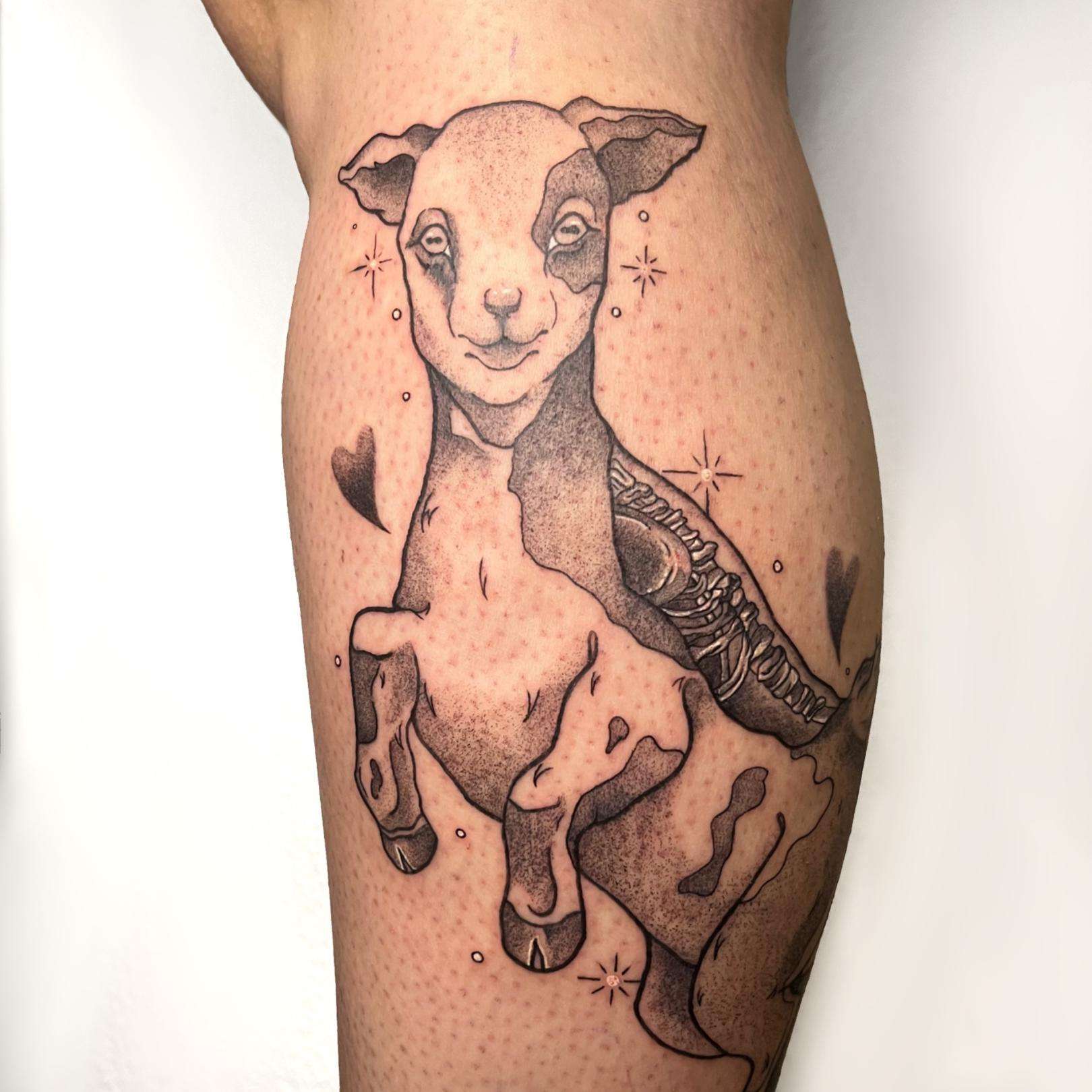 Illustrative blackwork tattoo